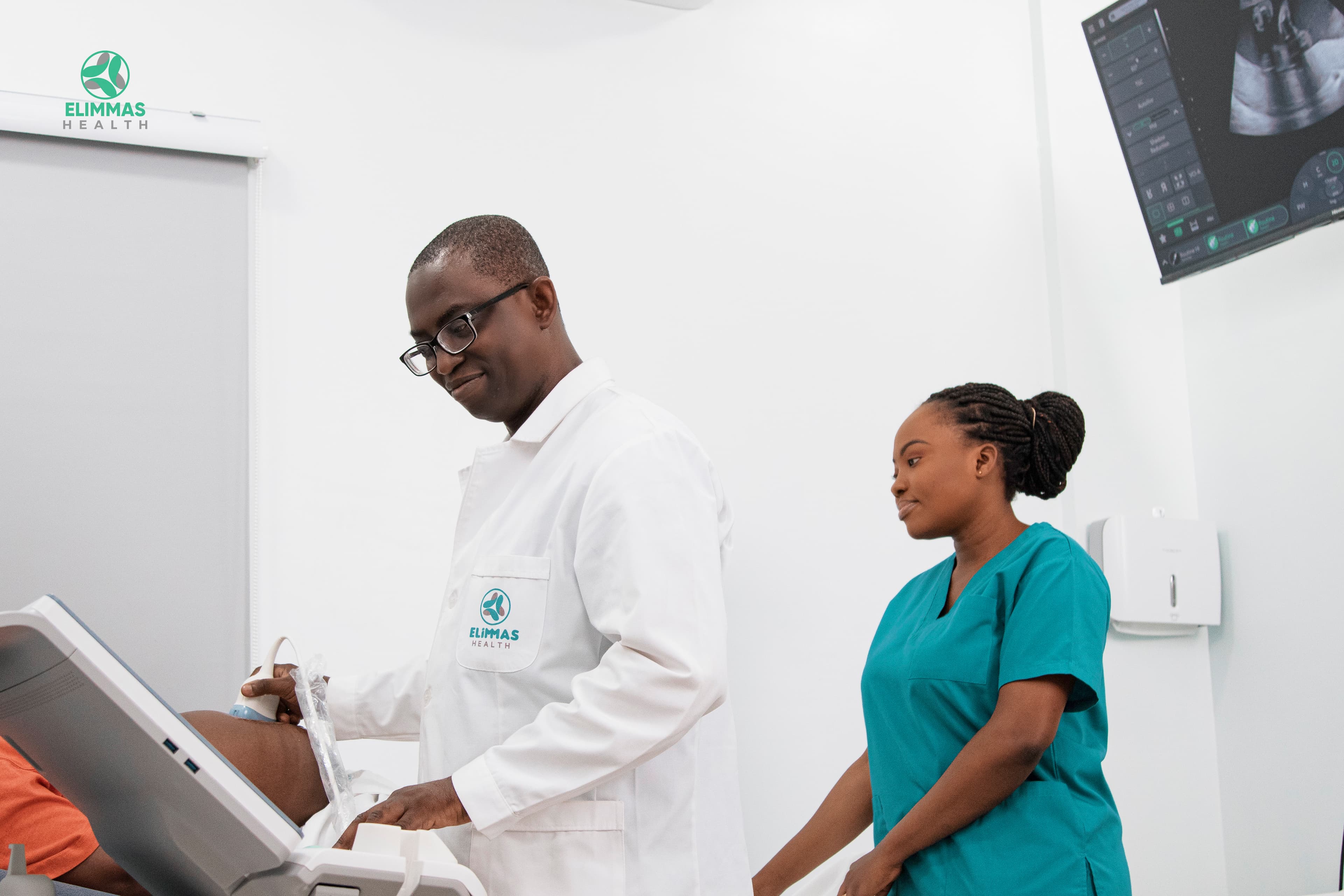 Happy family with newborn baby in hospital room
